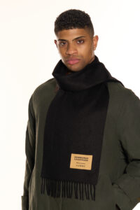 A black-colored cashmere scarf in a stylish premium box.