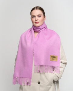 A young woman and her mother both wearing Scott Cashmere scarves, showcasing timeless fashion across generations.